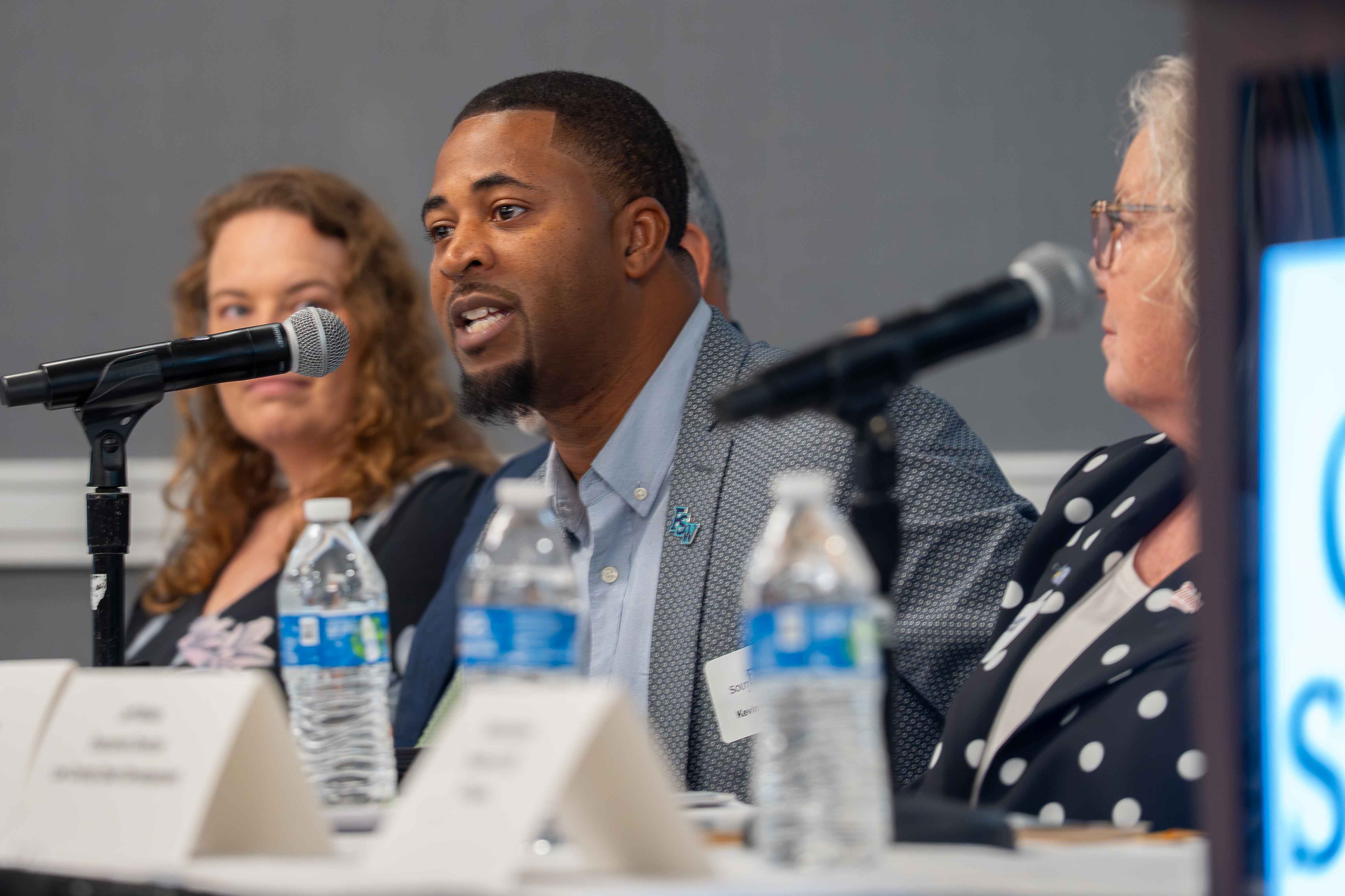 Dr. Kevin Lynum addressing a question during the panel discussion