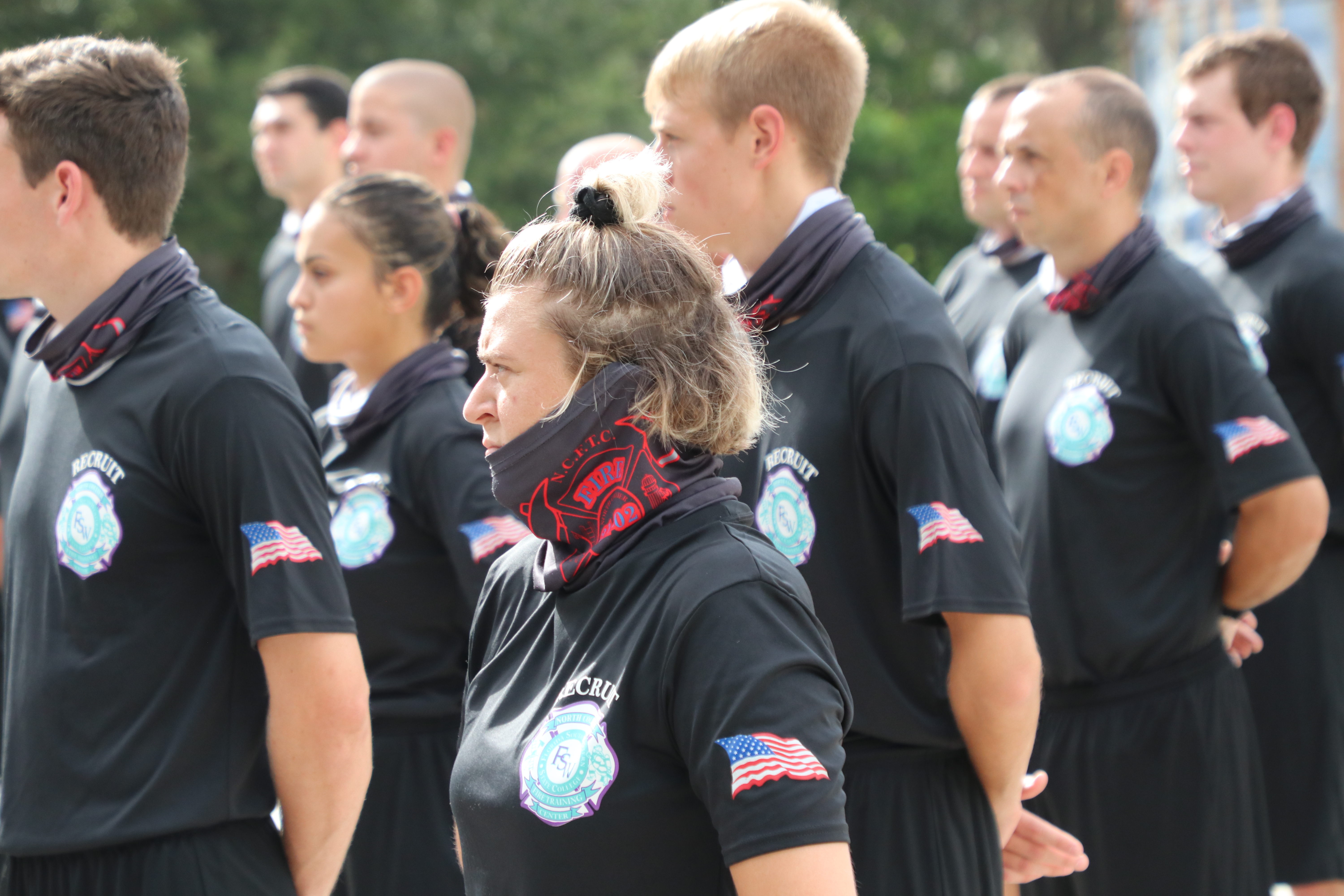 FSW fire students stading in formation towards the left.