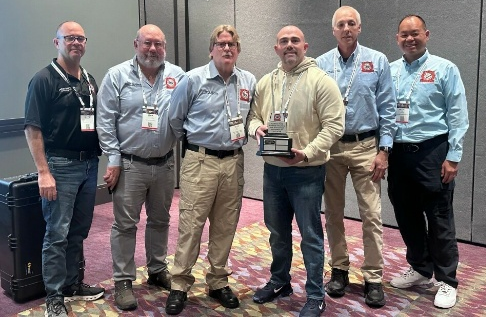 Firefighter instructors show the Florida Fire Service award.