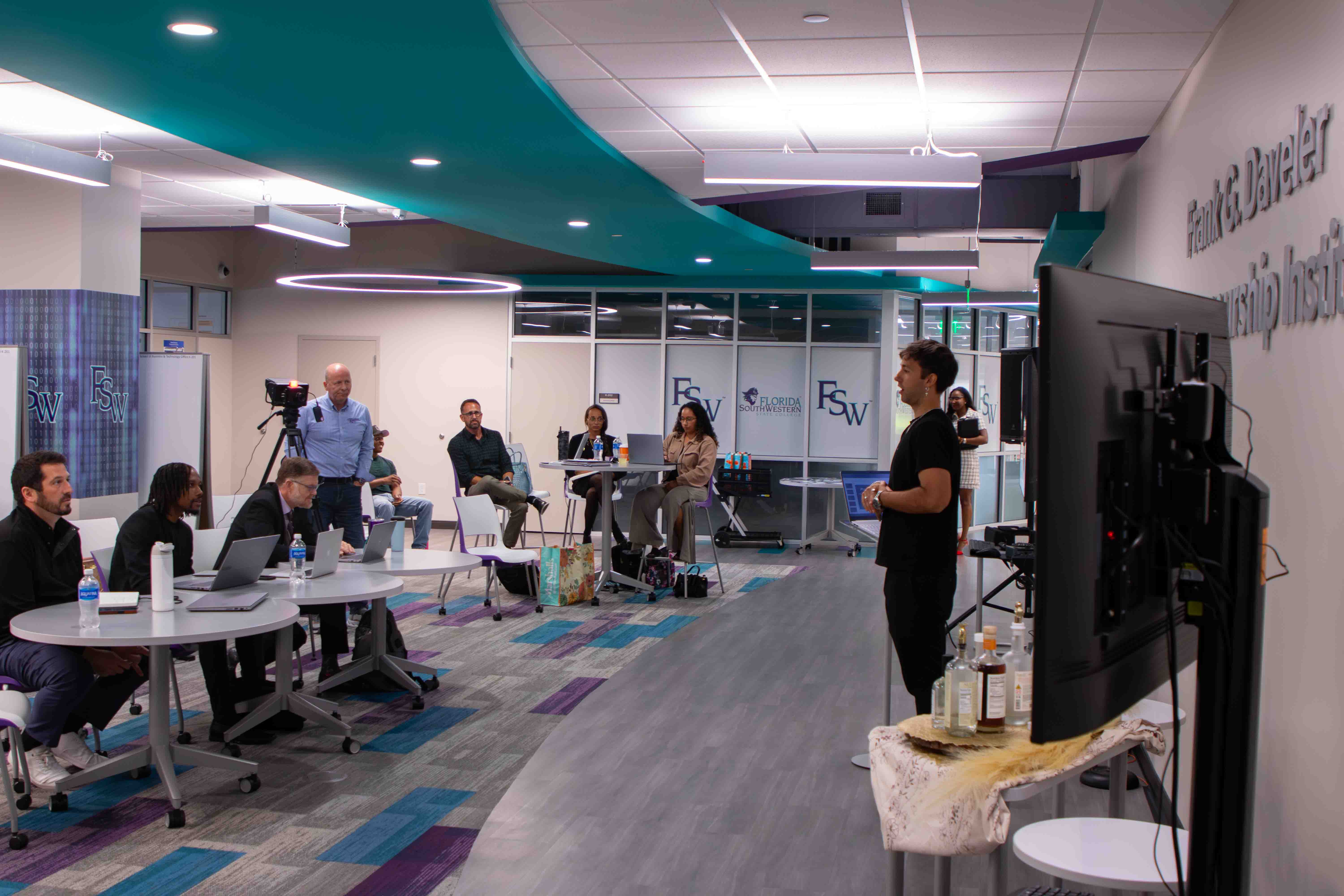 First-year student Jonathan Hernandez pitches his idea to expand his towing company, ProntoW LLC.