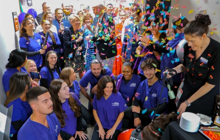 FSW radiologic technology students and faculty celebrate the opening of the new lab as colorful confetti fills the room.