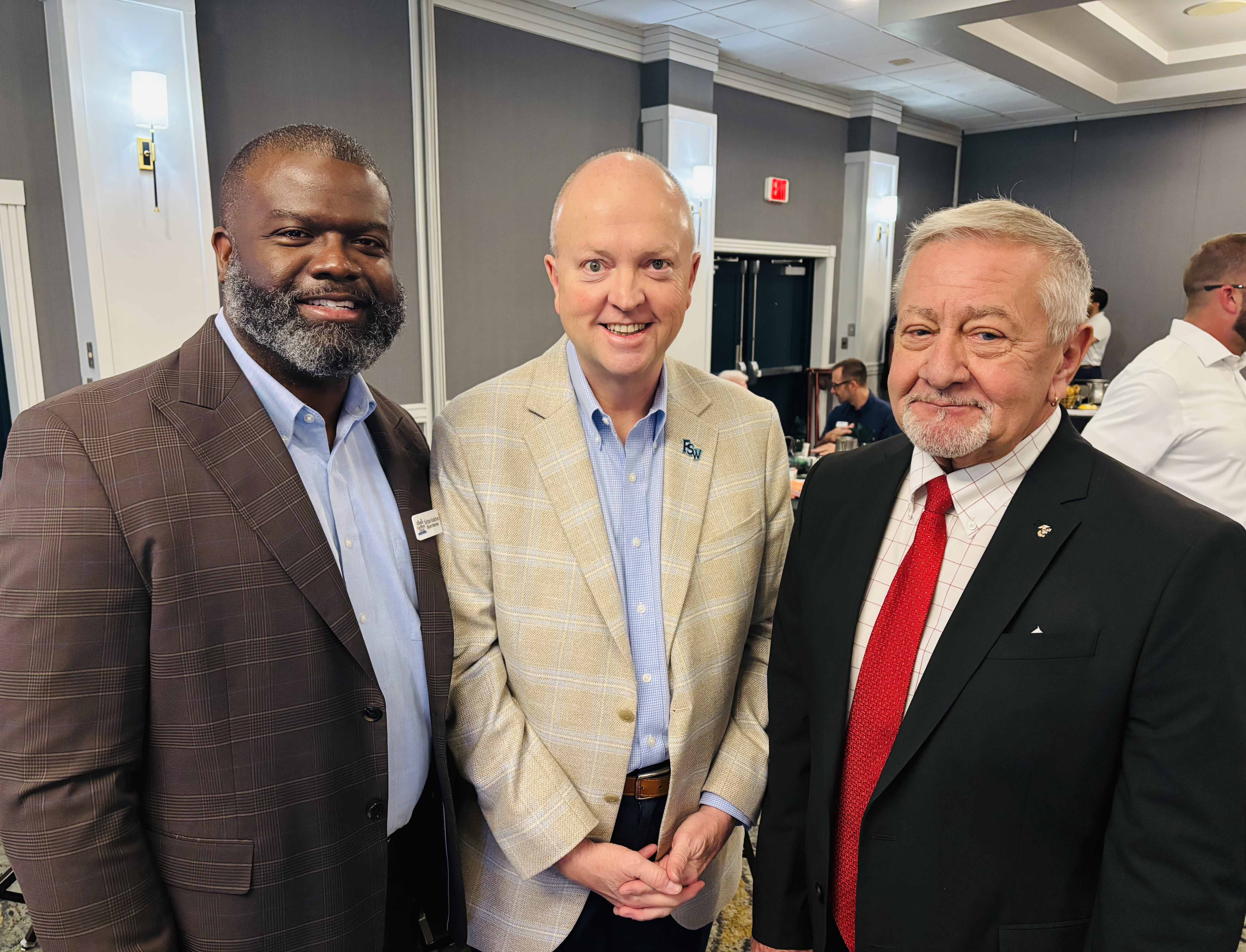 President Jeff Allbritten with Selynto Anderson of Lee Health and Dave Miller of the SWFL Chamber