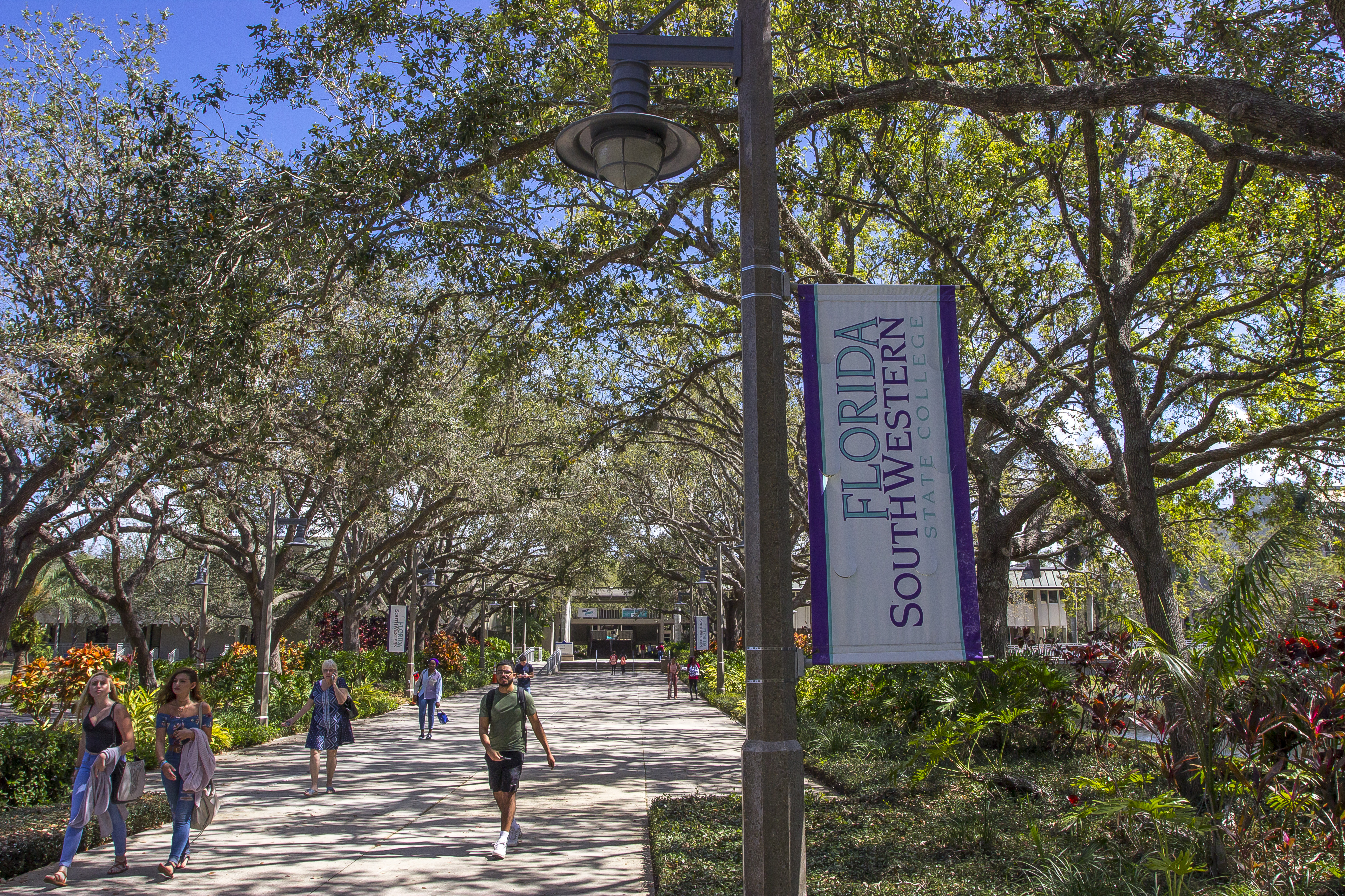 Photo of students walking outside on FSW Lee campus